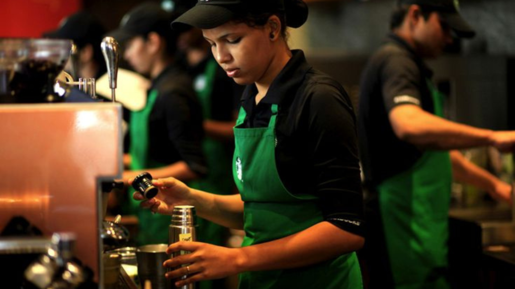 Starbucks staff making coffee