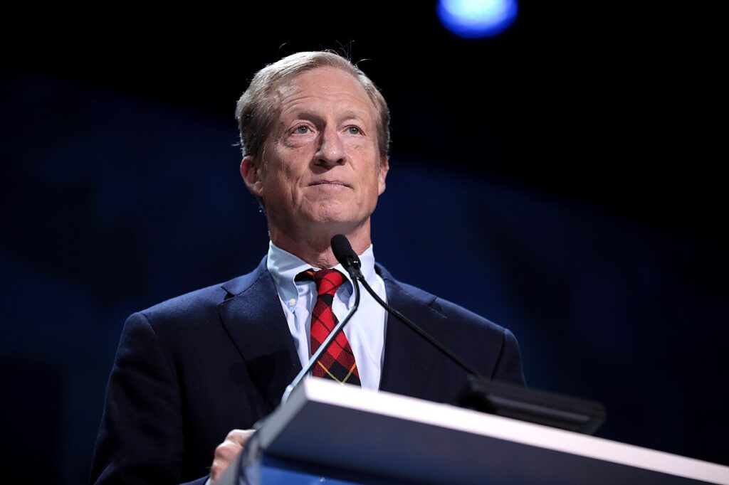 Steyer addressing an audience at a Democratic Party meeting