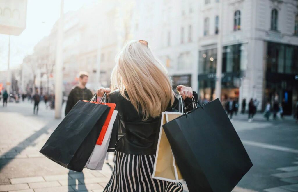 Female with shopping bags on a street