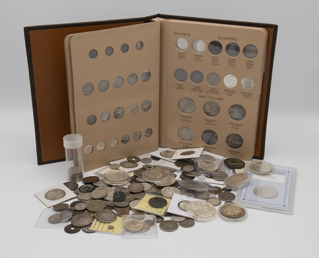 A coin album with a pile of coins