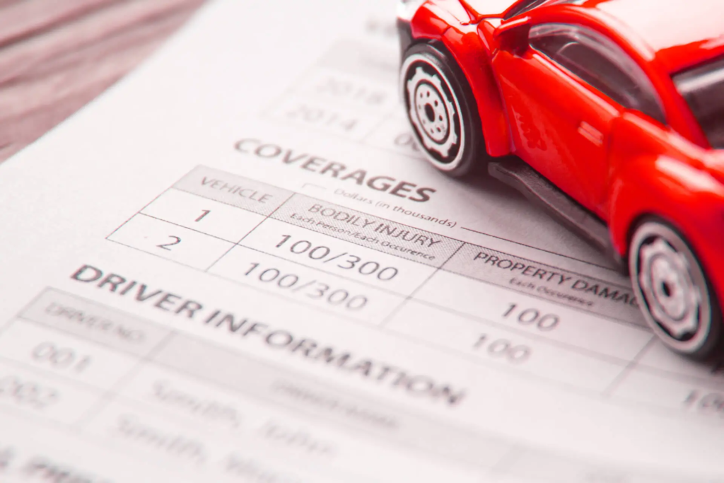 Model car on an insurance policy form