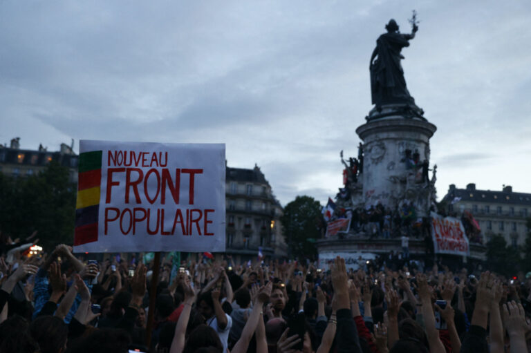 Supporters of the NFP at a rally