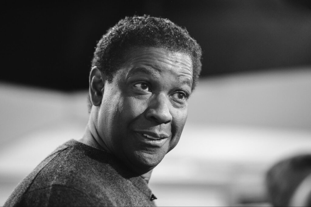 Headshot of smiling Denzel