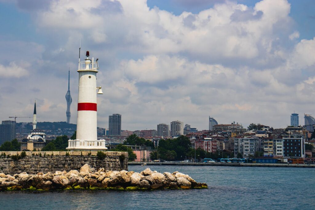 View of the Kadikoy Lighthouse and Skyline of Istanbul in the Background