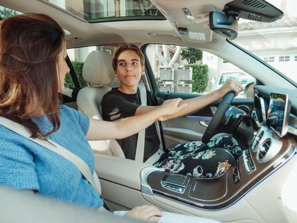 Mother and son inside a car