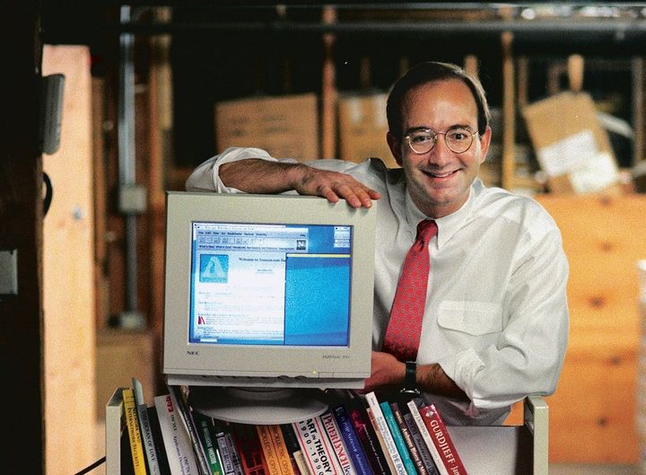 Jeff Bezos celebrating the first Amazon order in 1995