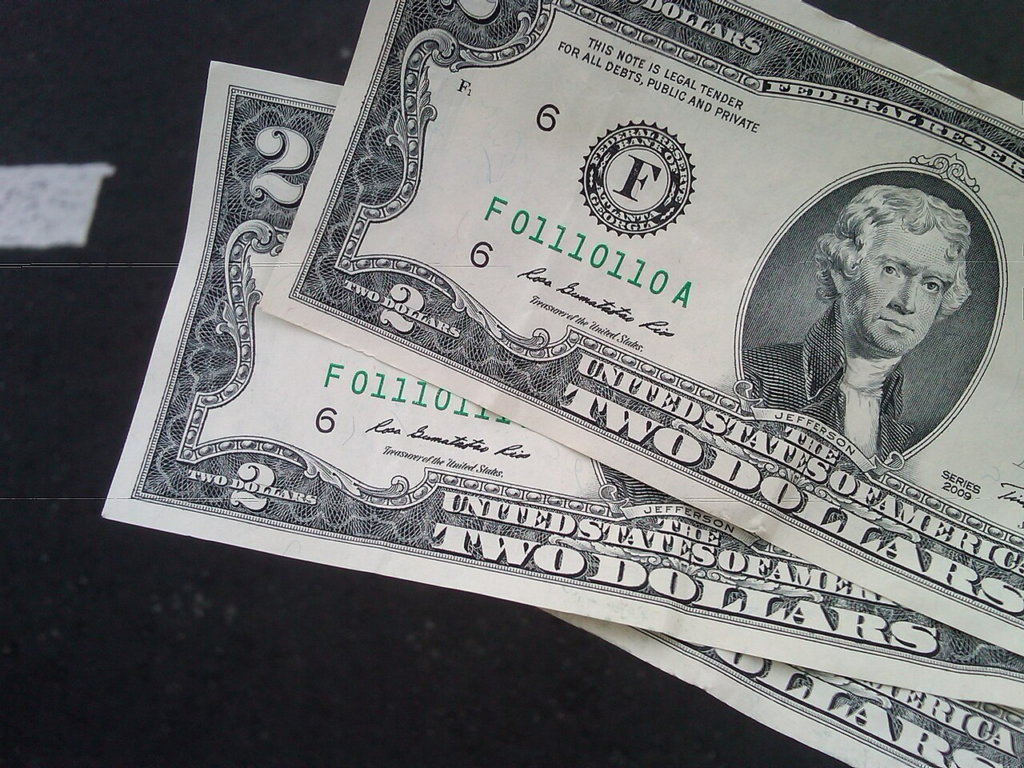 Three consecutively numbered two-dollar bills