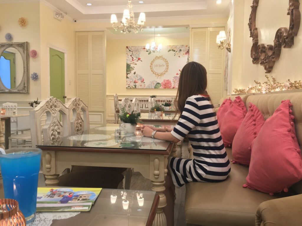 Lady sitting in an exquisite restaurant