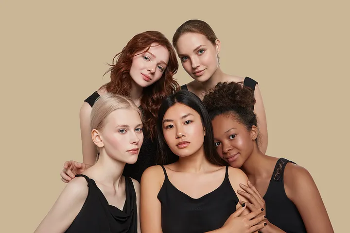 Women of different skin tones and race