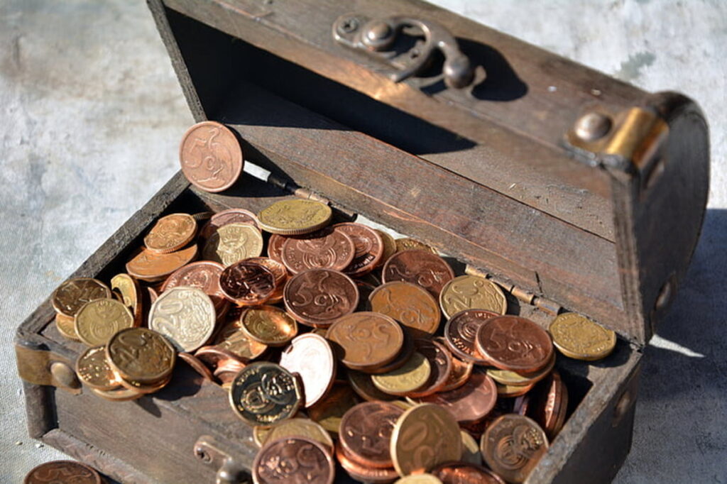 Copper coins in a wooden safe