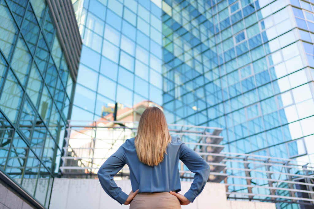 Standing in front of an office building