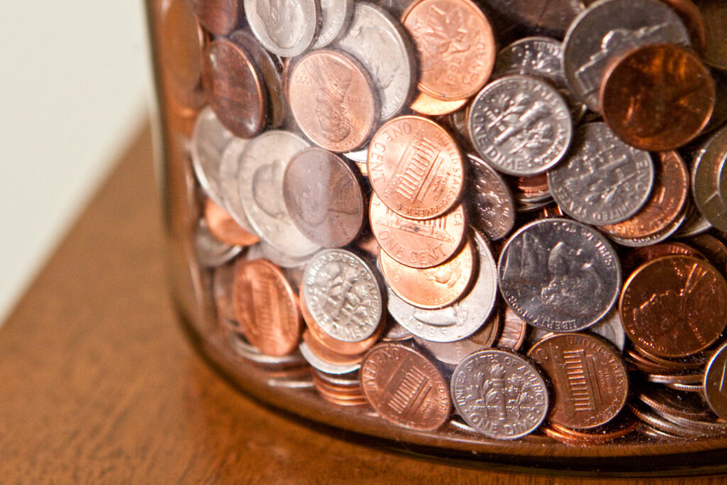 Collection of coins in a jar