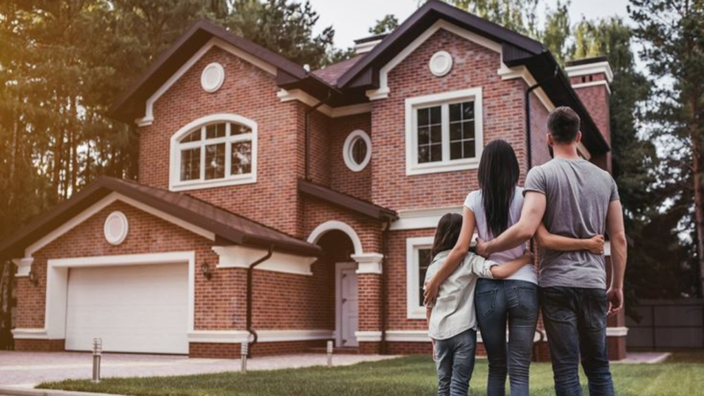 Family in front of new home