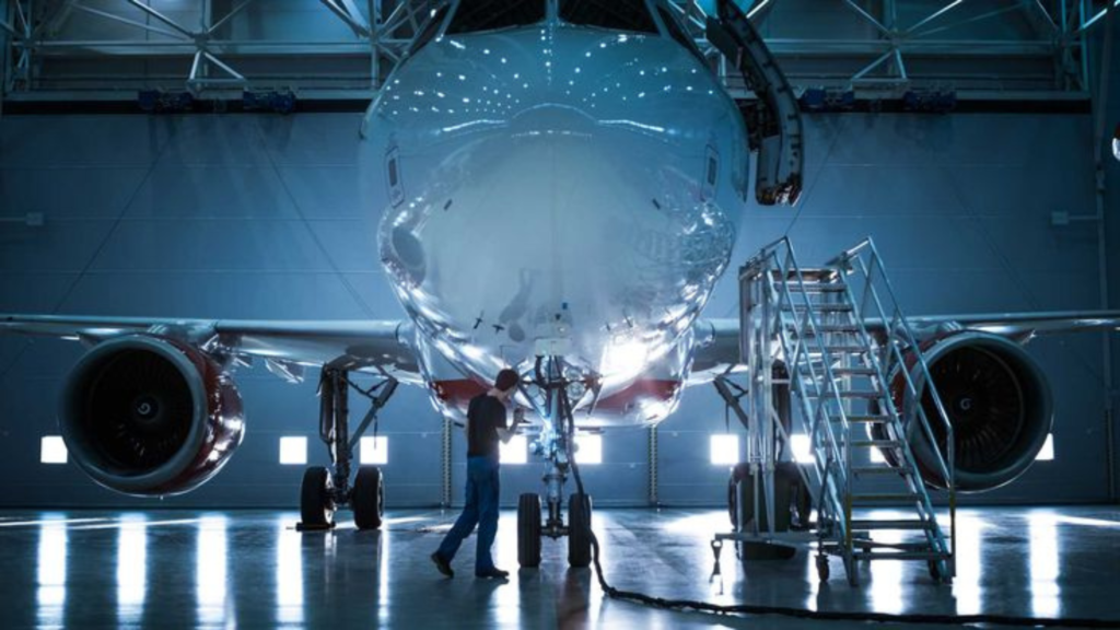 A plane undergoing servicing