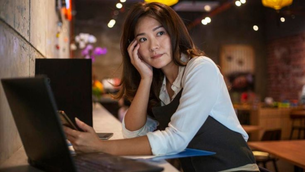 Asian woman taking a work break