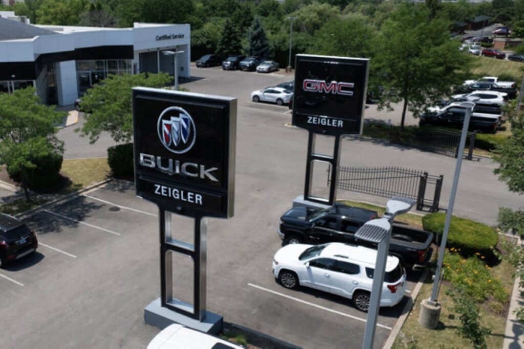 Buick and GMC signs outside a dealership