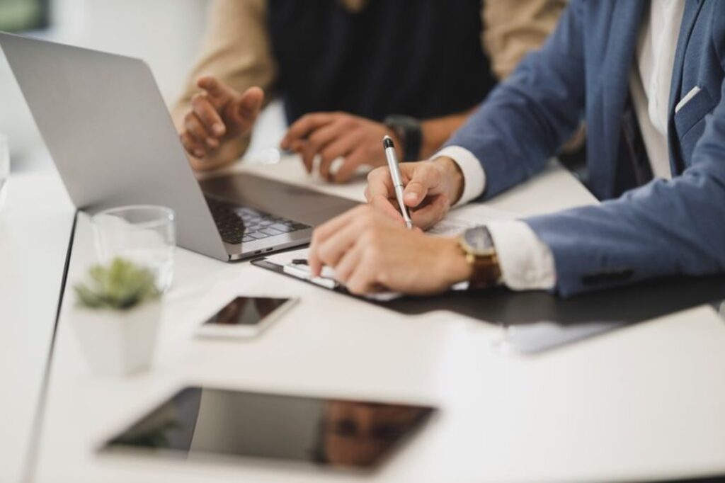 Two employees working together