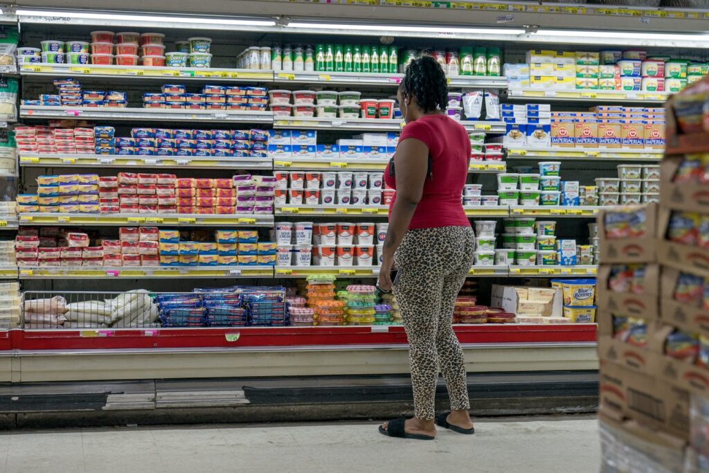 A woman shopping in a grocery store