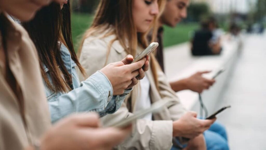 Gen Zers thumbing at their smartphones