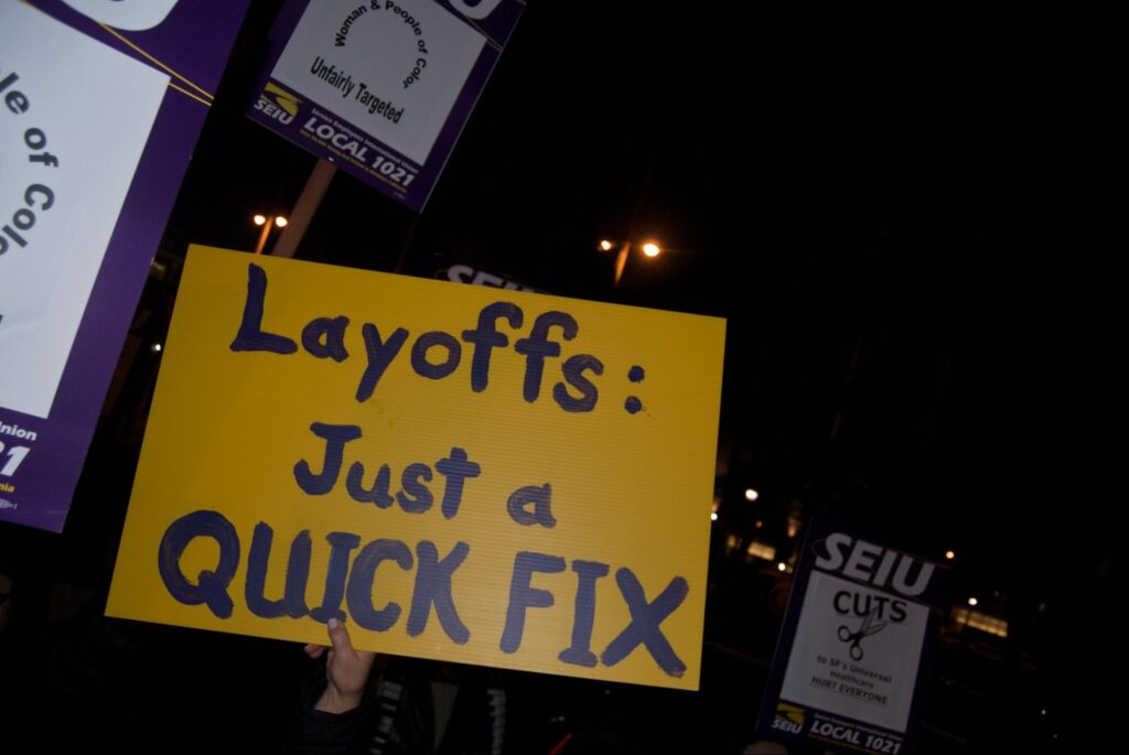 Placards in protest of layoffs