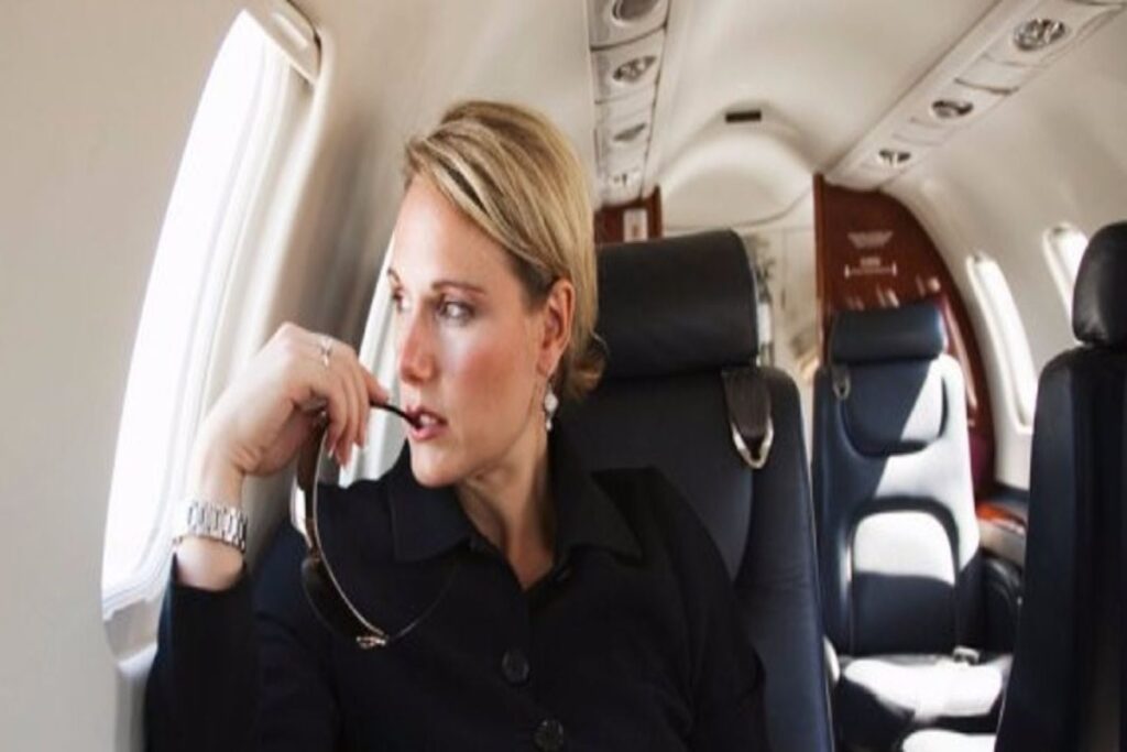 Rich woman in a private jet