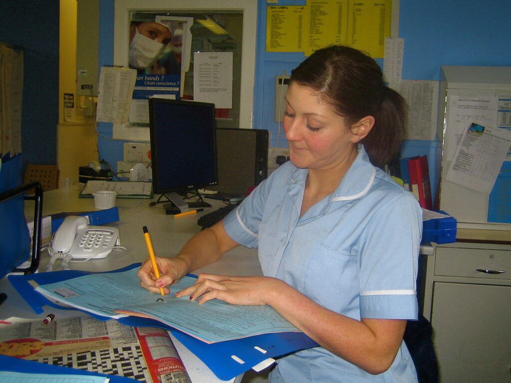 British nurse in nurses' station