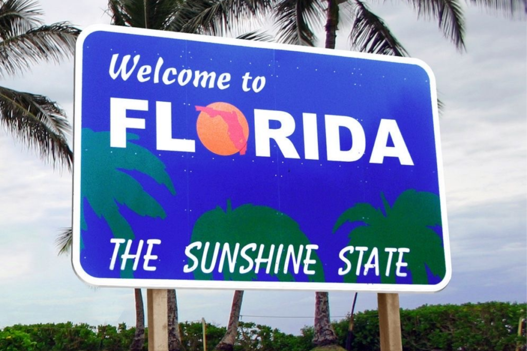 An image of a billboard showing a “Welcome to Florida” sign