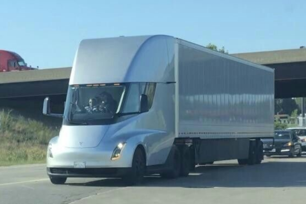 An image of a Tesla electric semi truck on the road