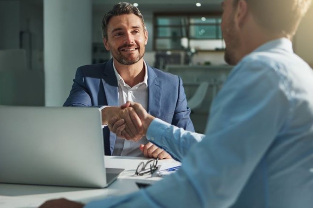 An image of people shaking hands