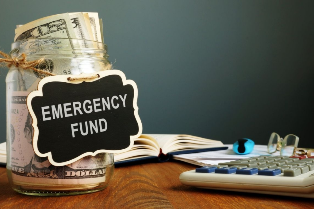 An image showing a jar of emergency funds on a table