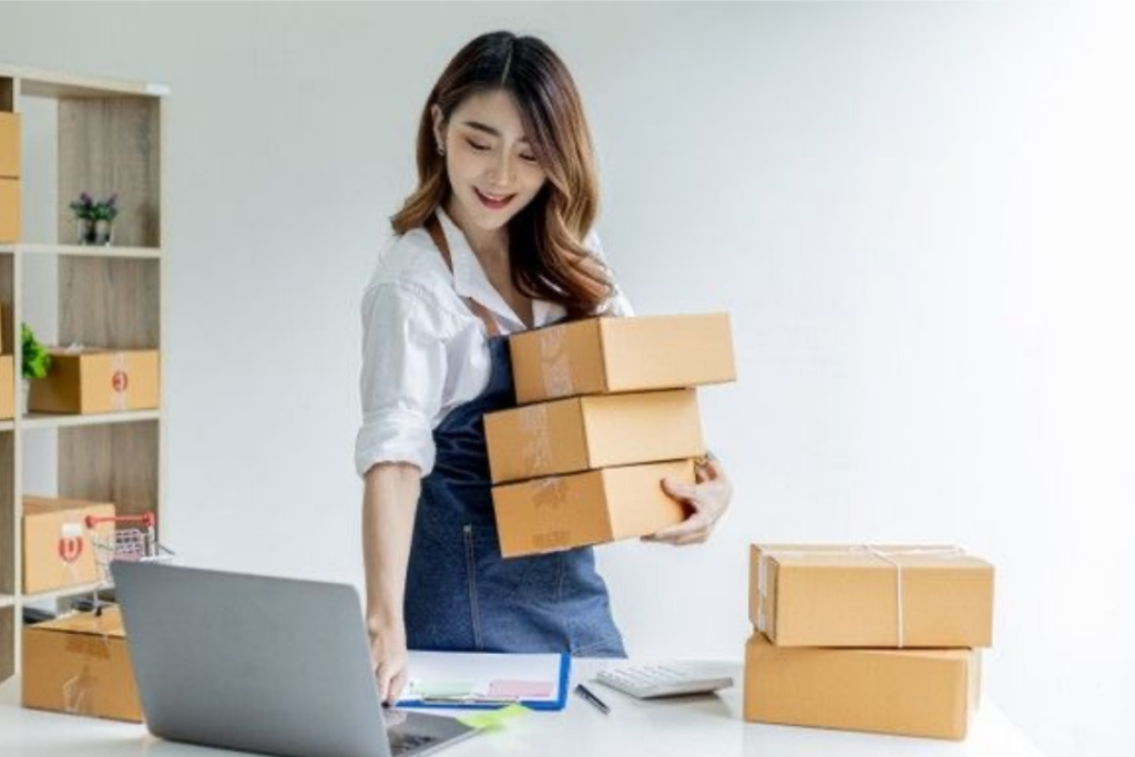 An image of a woman holding packages