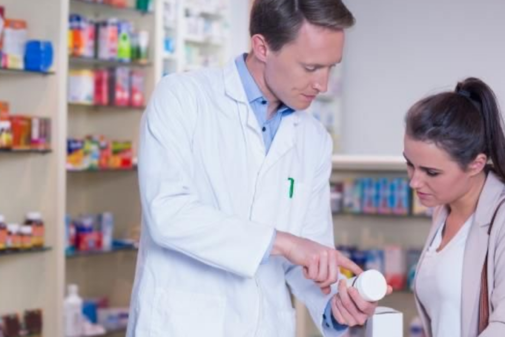 An image of a doctor prescribing drugs to a patient