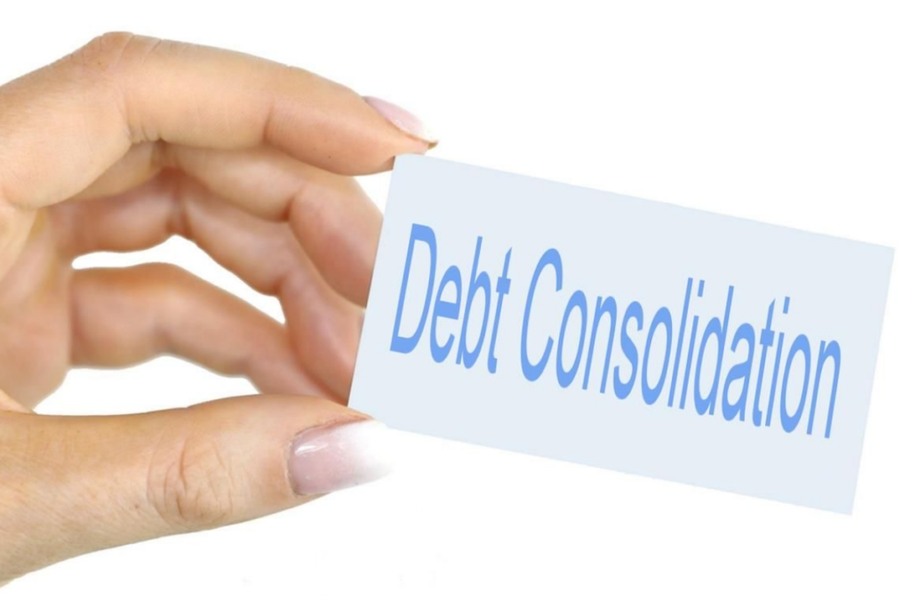 An image of a person holding a paper with debt consolidation written on it.