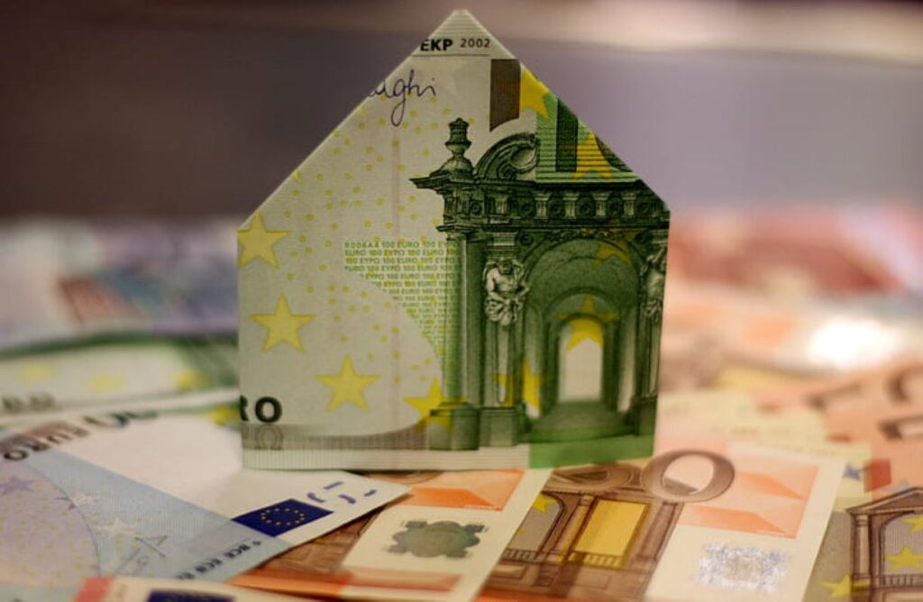 Euro banknote in the shape of a house