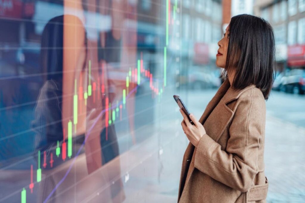 Woman looking at stock market charts