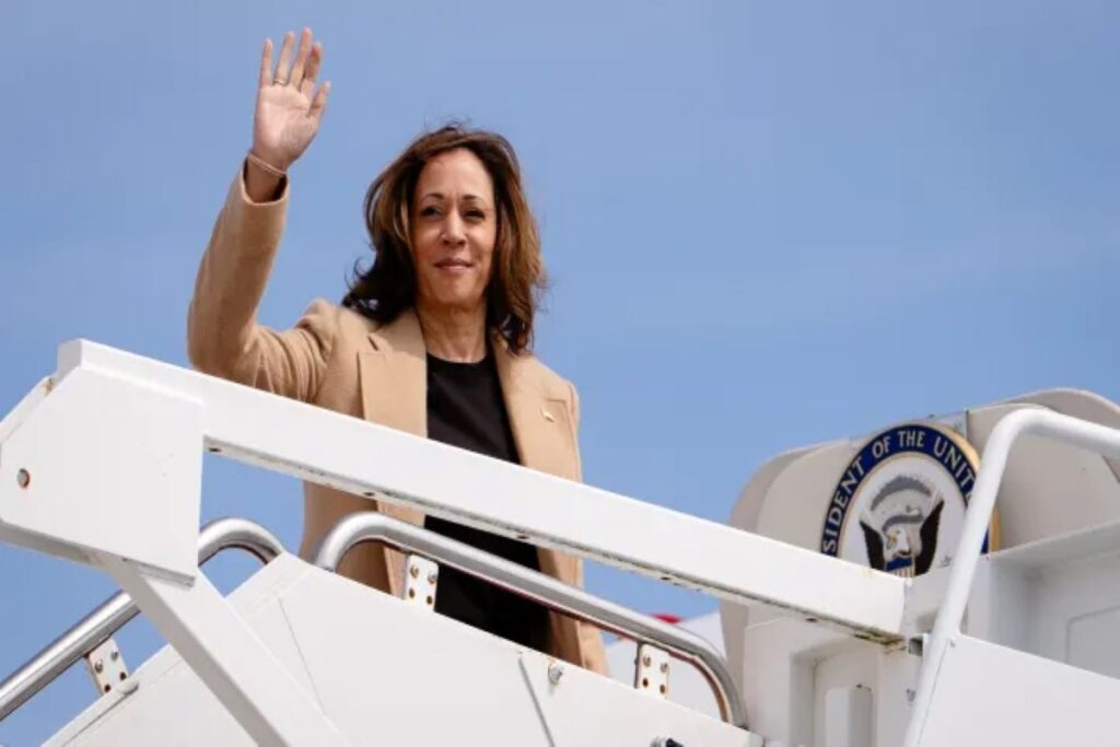 Vice President Kamala Harris waving before boarding Airforce 2