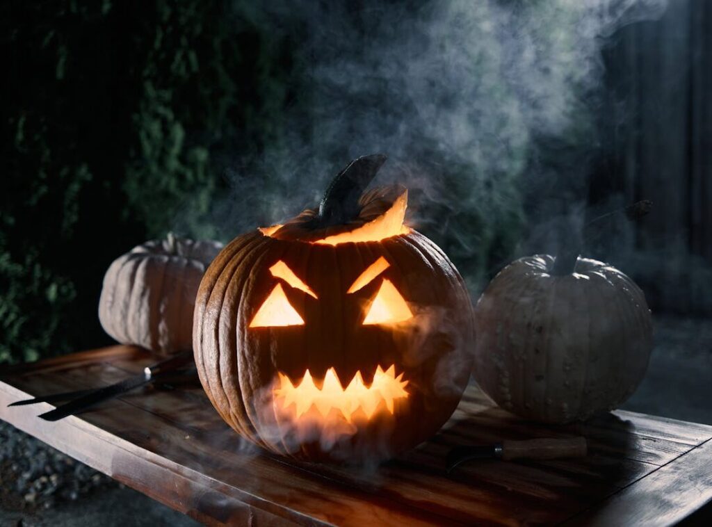 Illuminated Halloween Pumpkin in Darkness