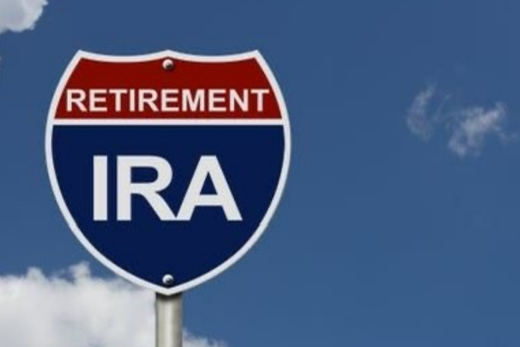 An image of a signpost with retirement IRA written on it