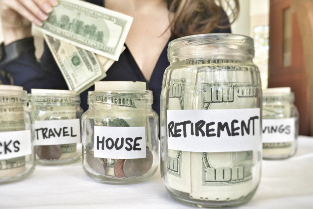 An image of labeled jars of money