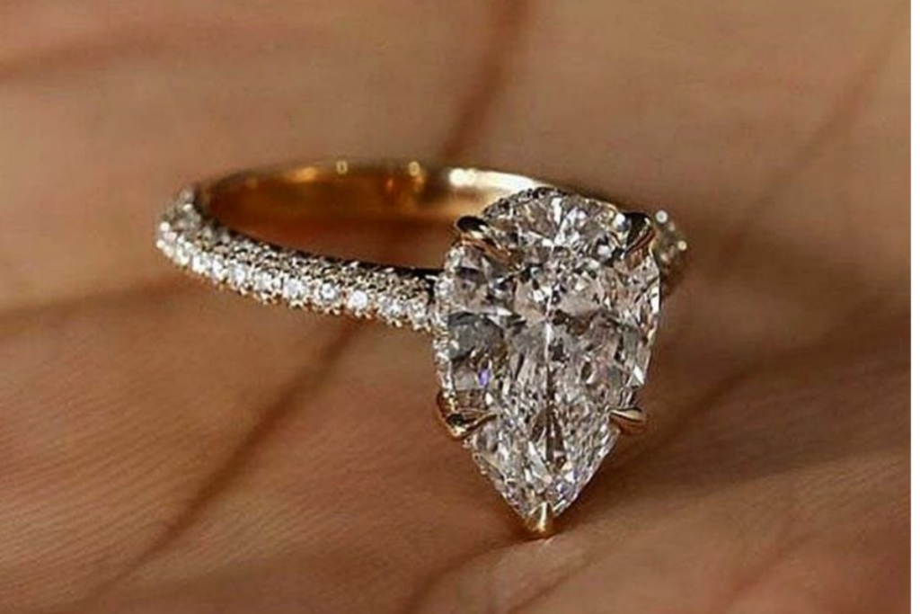 An image of a pear-shaped diamond engagement ring