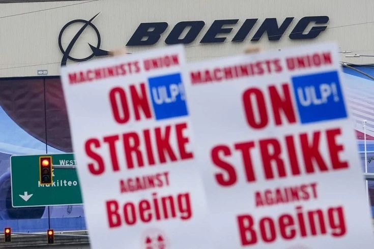 An image of strike placards at Boeing