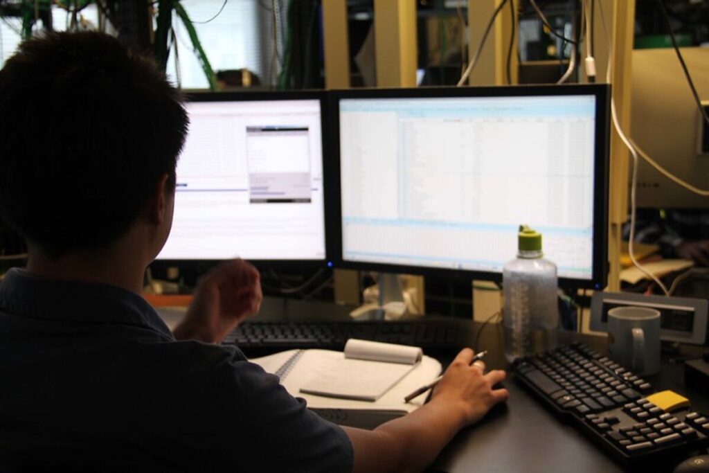 A computer forensic analyst reviews information gathered from a computer