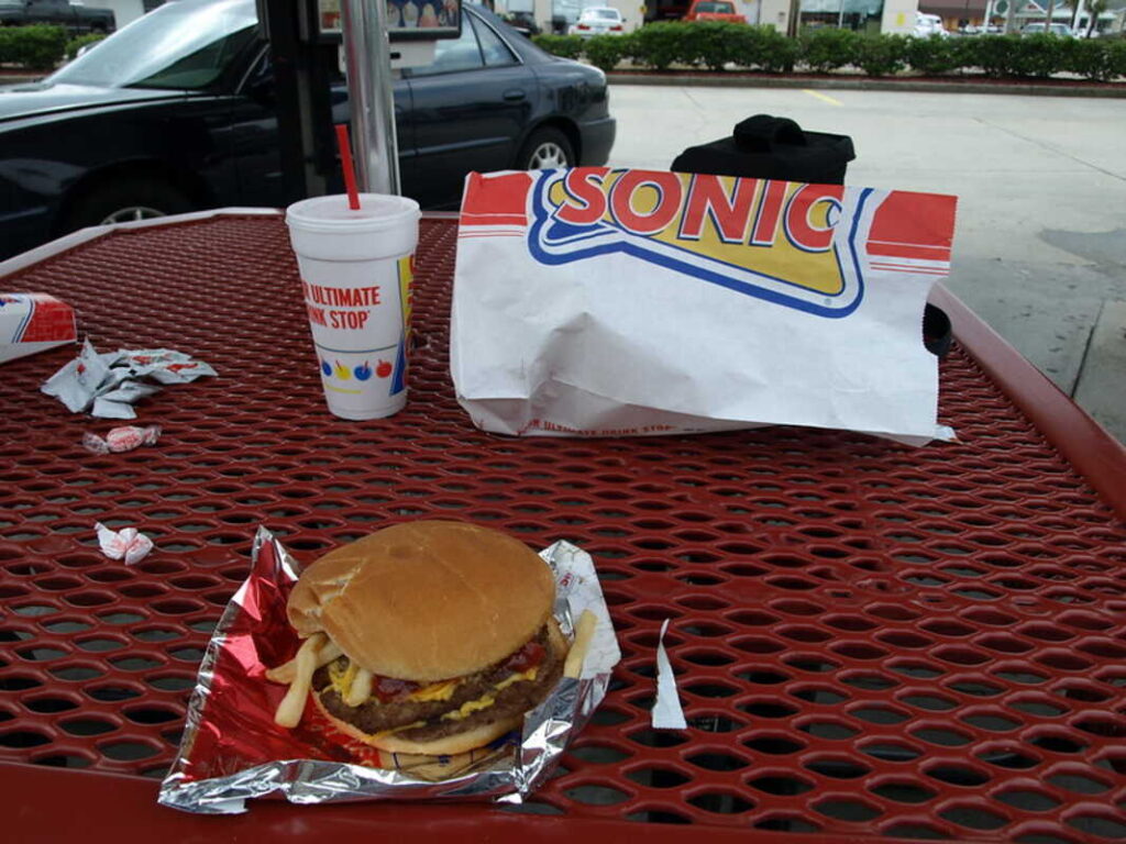 Customer puts fries between burger 