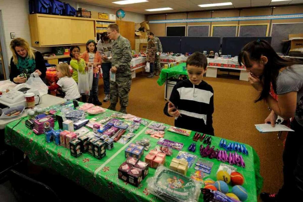 Hill Field Elementary students look for holiday gifts at the school's Santa Workshop