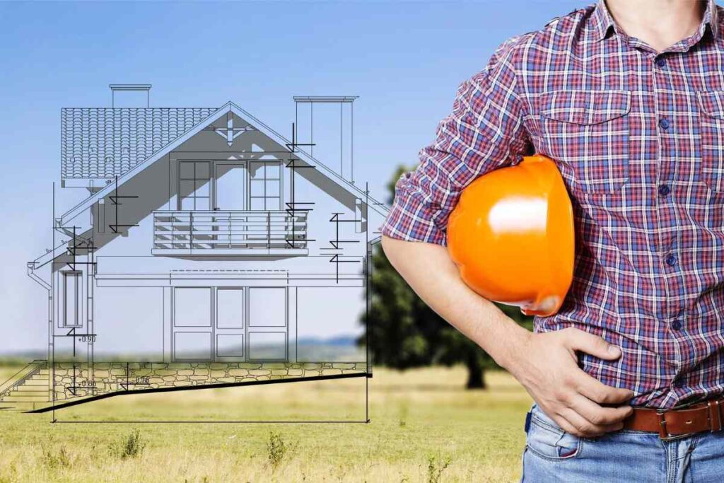 A man standing in front of a building structure