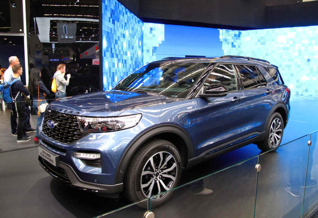 A Ford Hybrid SUV in a showroom 
