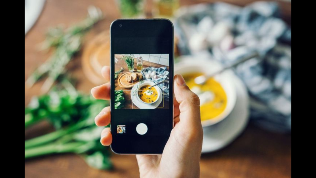 Taking a photo of a meal