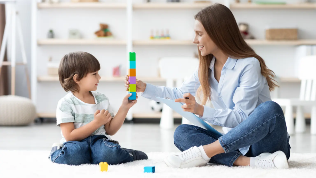 A woman and a kid playing games