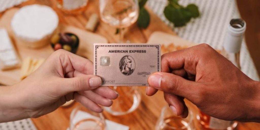 An AmEx cardholder paying with their card