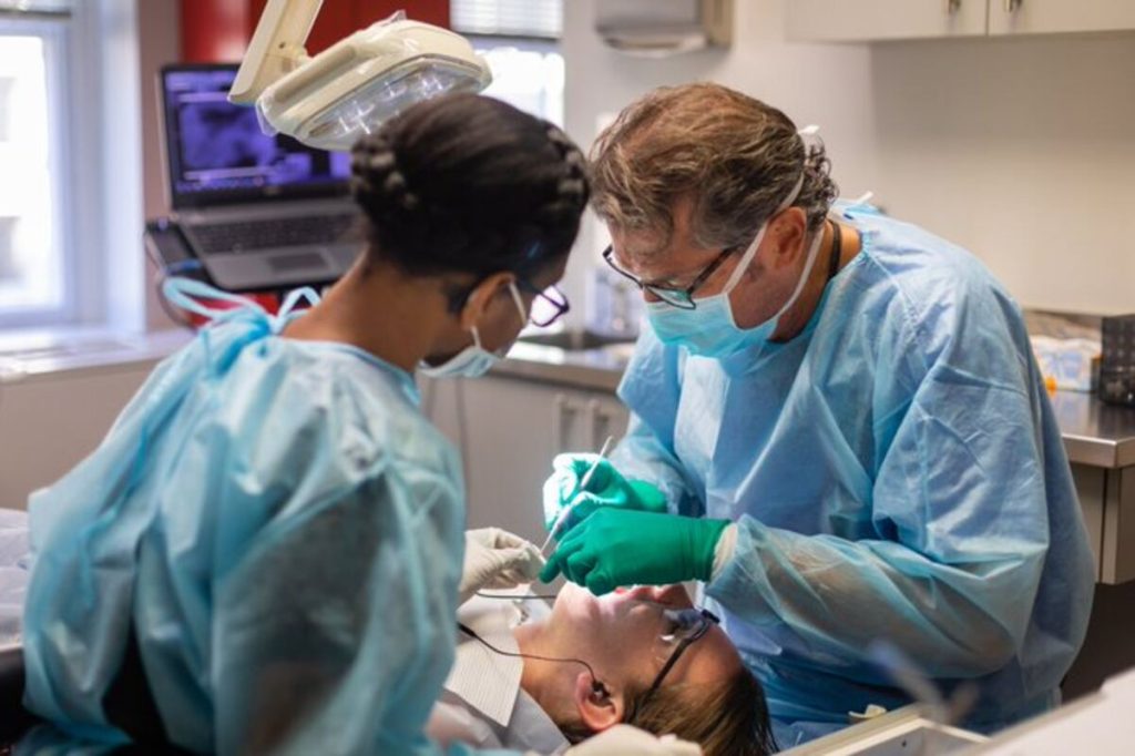 Endodontist performing a procedure